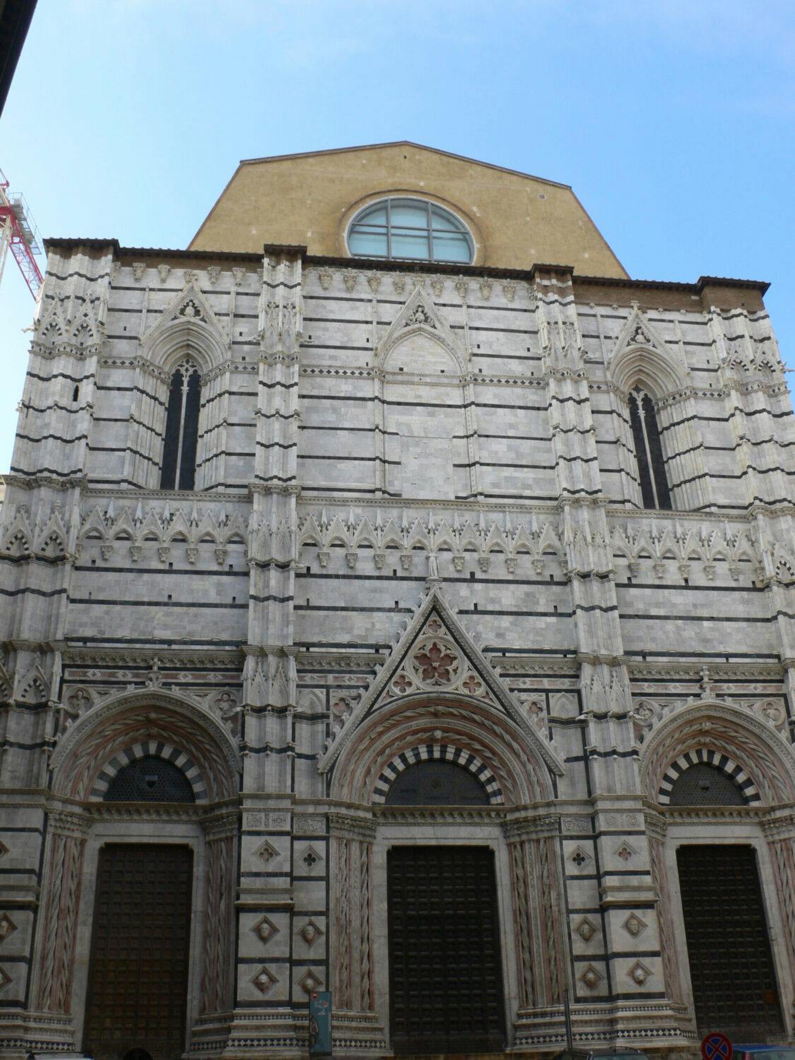 Facciate laterali del Duomo di Siena e facciata del Battistero di San Giovanni